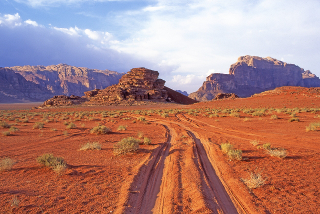 John Wick's Desert Pursuit: The Stunning Wadi Rum in Jordan" - Wadi Rum Reserve | Secret World Trip Planner