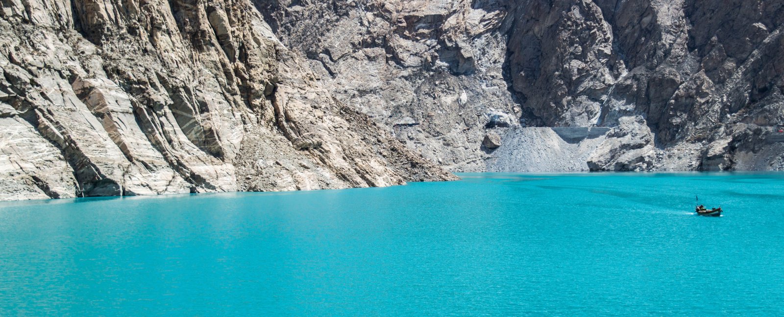 Attabad lake, nestled among the peaks of the Karakoram - Hunza Nagar | Secret World Trip Planner