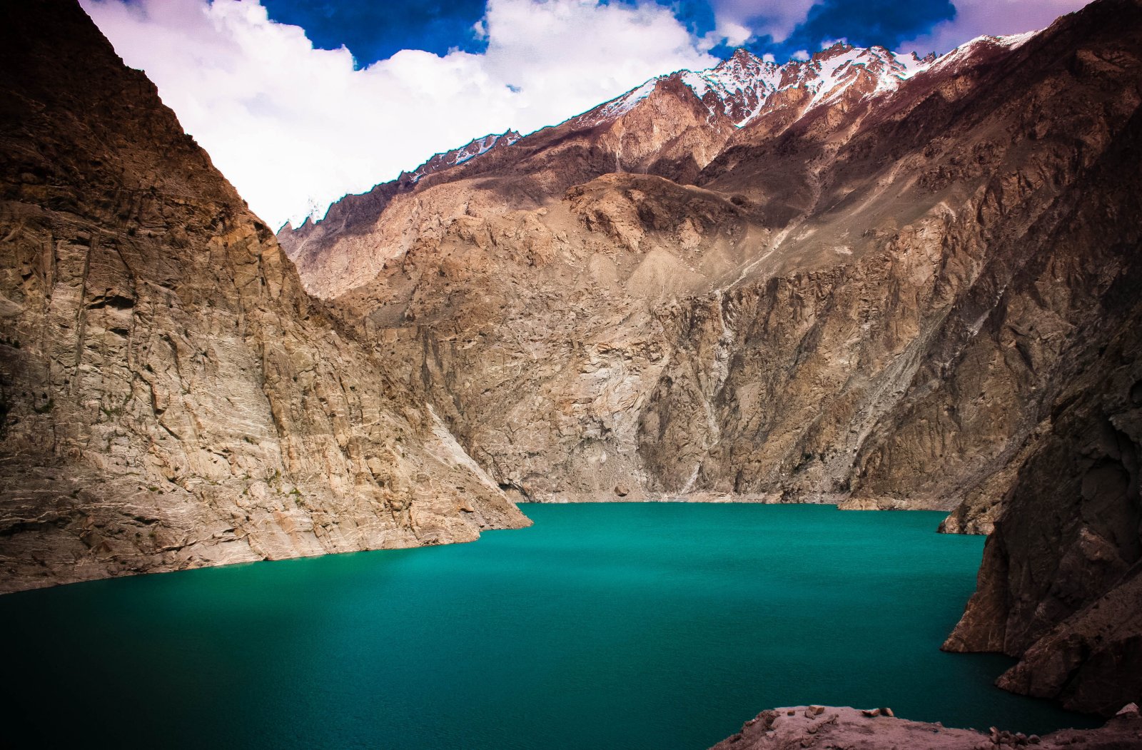 Attabad lake, nestled among the peaks of the Karakoram - Hunza Nagar | Secret World Trip Planner