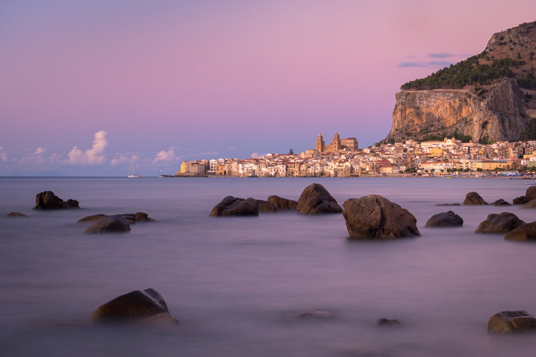 Cefalù: Sunset on the beach - Secret World - 90015 Cefalù PA | Secret World Trip Planner
