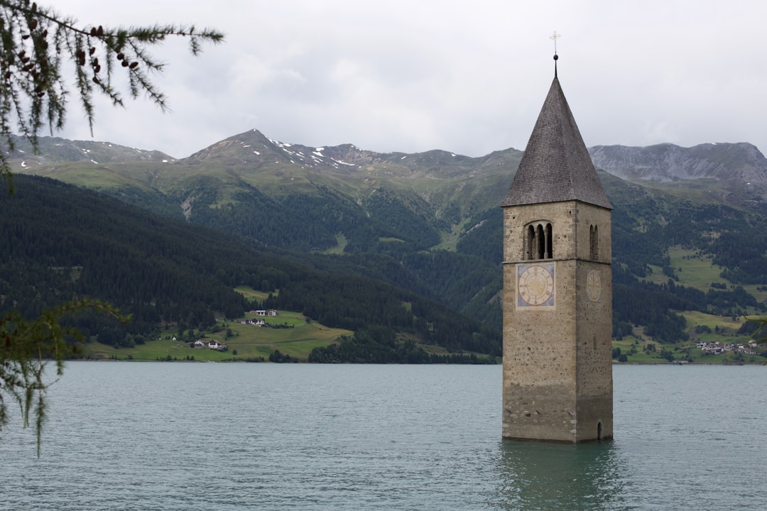 The Submerged Bell Tower, Located in Lake Resia - Resia | Secret World Trip Planner