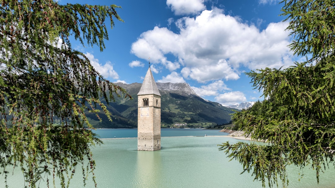 The Submerged Bell Tower, Located in Lake Resia - Resia | Secret World Trip Planner
