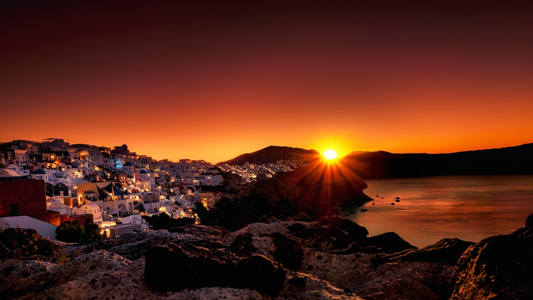 Dreamy Sunsets in Santorini: The Magic of Oía - Nik. Nomikou | Secret World Trip Planner