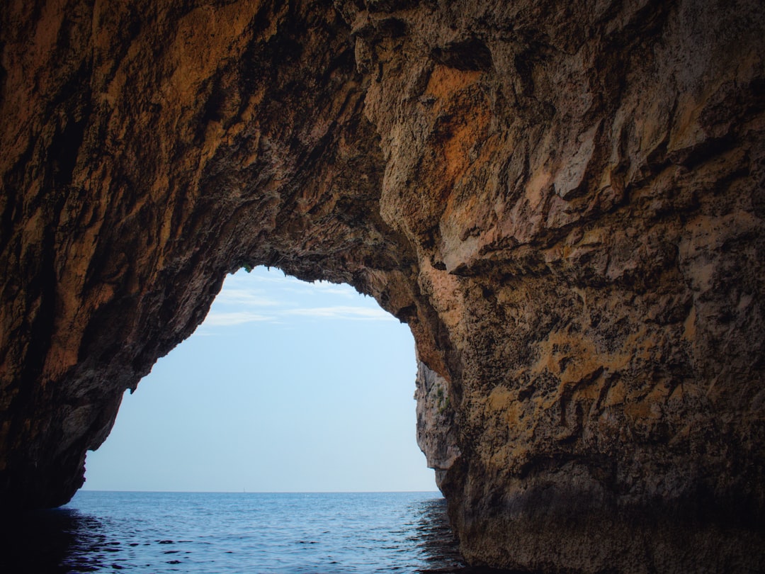 Discover the Magic of the Blue Grotto in Malta - RF93+XP3 | Secret World Trip Planner