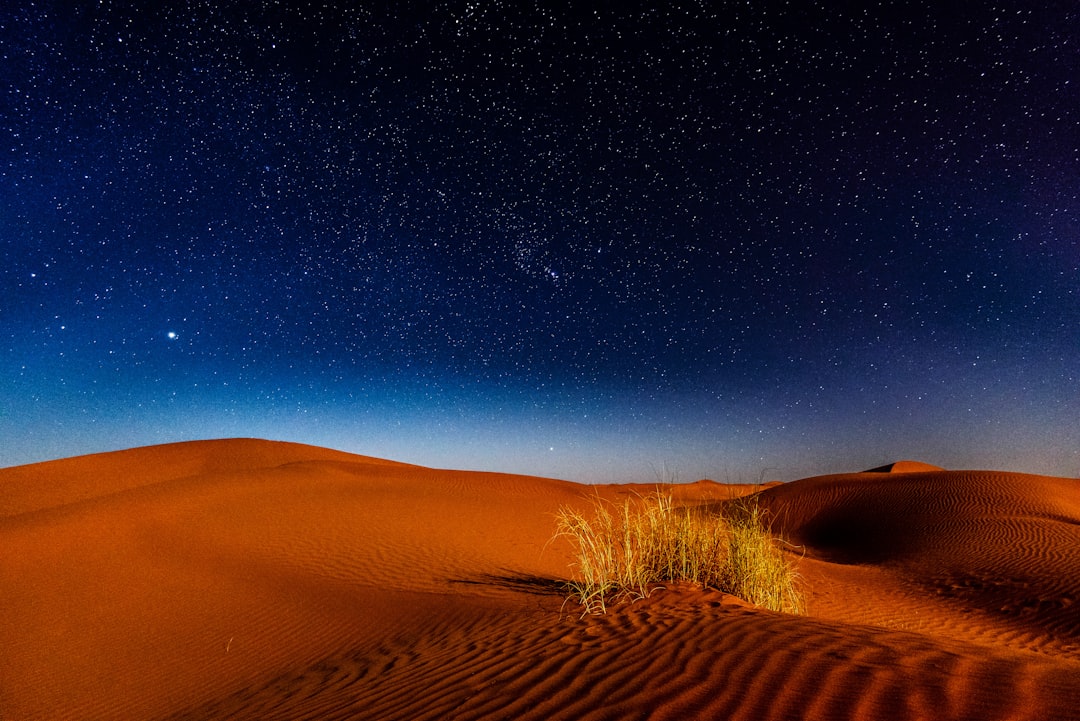 Ash Sharqiyah Sands: The Orange Desert of Oman - Mandinat Al Sultan Qaboos Bidiyah OM Bidiyah OM | Secret World Trip Planner