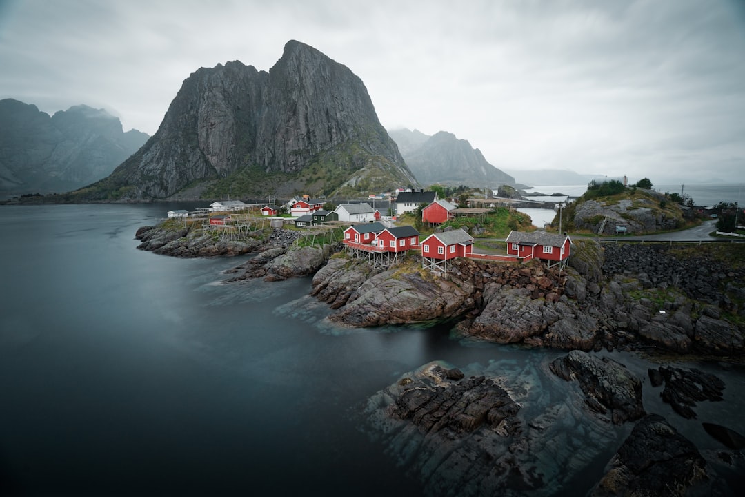 Hamnøy: The Red Cabins Reflecting Lofoten Fjords - Olenilsøya | Secret World Trip Planner